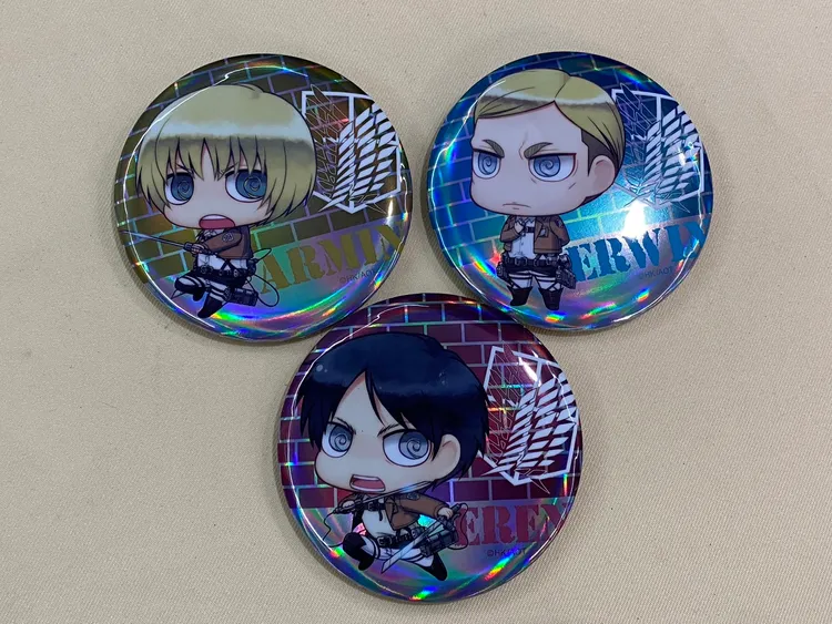 「進擊的巨人」主題徽章，共有八款，將隨機送出。觀旅局提供