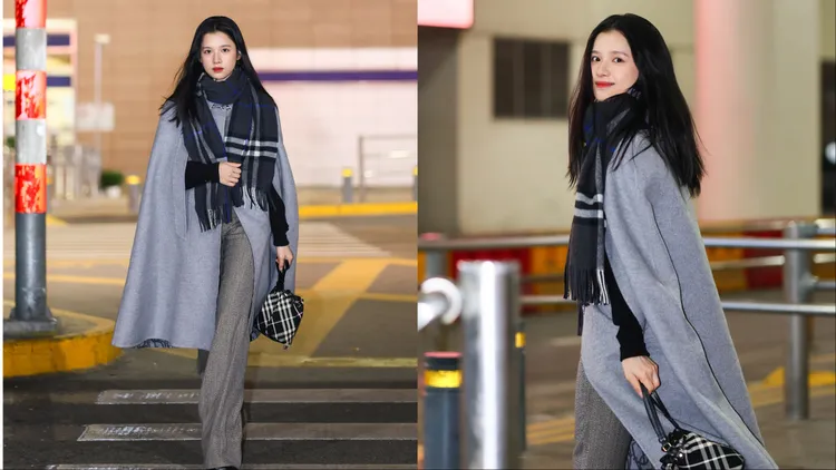 張婧儀以羊毛披肩、喀什米爾圍巾提升褲裝造型完整度。品牌提供