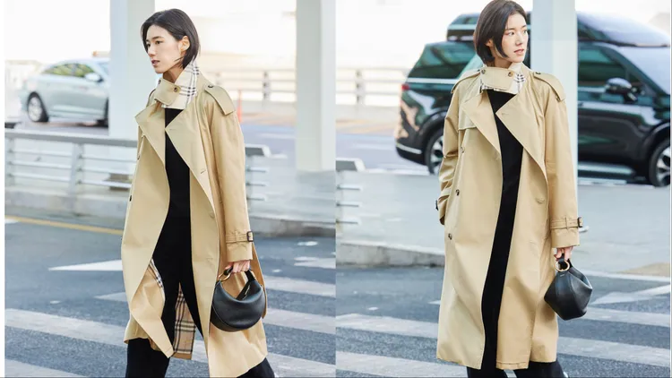 鄭恩彩以全黑穿搭配上BURBERRY經典風衣。品牌提供