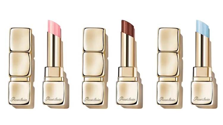 嬌蘭KISSKISS法式之吻波光蜜糖護唇膏（左起）#358、#878、#056，各1450元。品牌提供