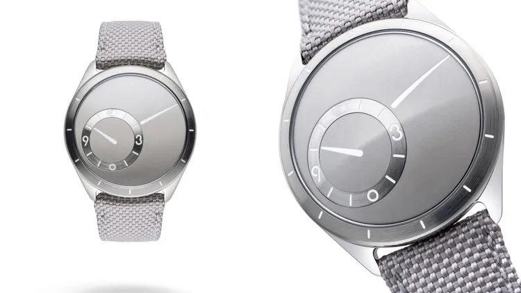 Ressence Type 9腕錶（溫暖灰），39mm，五級鈦合金錶殼，五級鈦合金錶盤，合成纖維編織錶帶，專利 ROCS 9自動上鍊機芯，動力儲存36小時，防水深度10米，51萬元。品牌提供