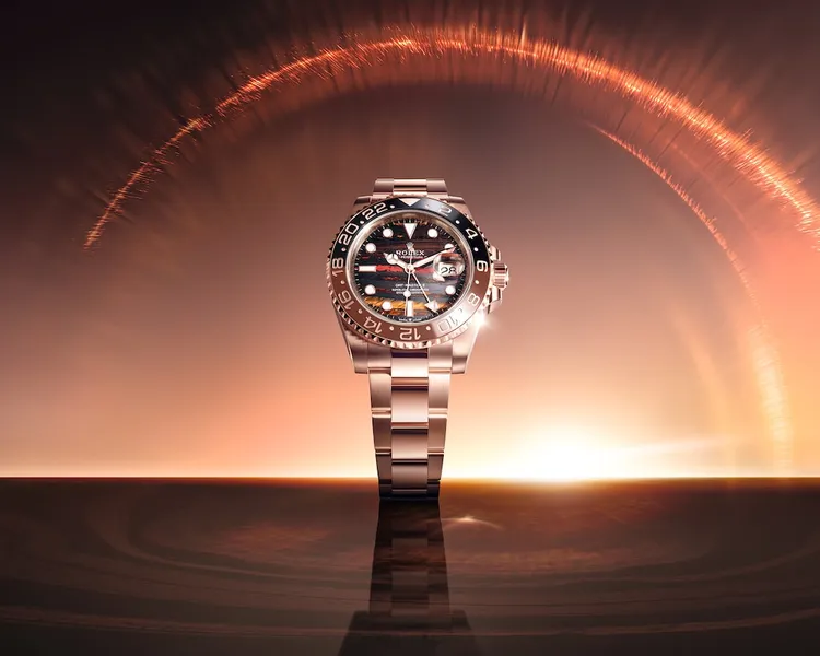 勞力士 OYSTER PERPETUAL GMT-MASTER II，40mm，18K永恆玫瑰金錶殼，鐵虎眼石錶面，蠔式錶帶，3285機芯，175萬6000元。品牌提供