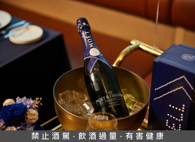 酩悅香檳經典瓶身由Louis Vuitton男裝創意總監菲瑞・威廉斯重新設計，可於台北W飯店Seasons by olivier e.、WOOBAR與指定房型內享用。業者提供