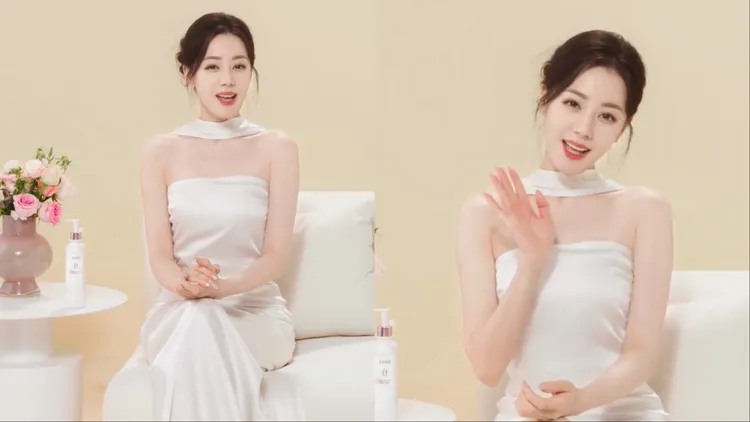 迪麗熱巴身上的LeToii Atelier禮服，以頸肩披巾設計襯托出天鵝頸與鎖骨線條。翻攝半畝花田微博