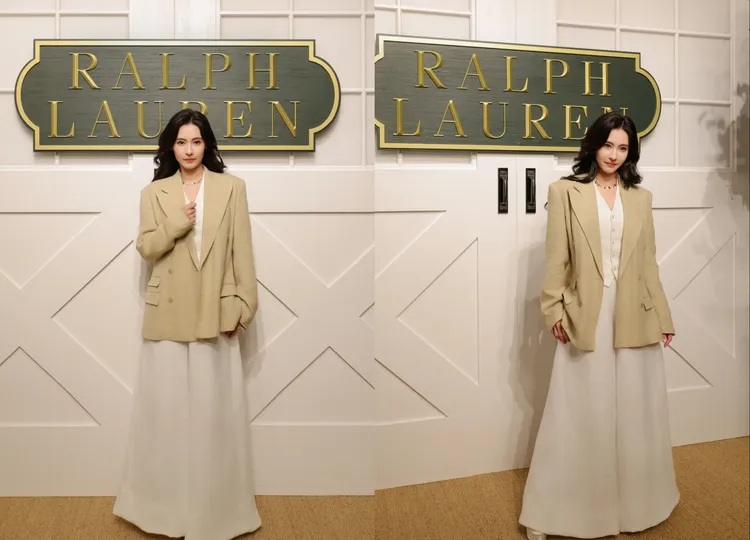 張柏芝以白色馬甲背心、寬褲搭配杏色西裝外套穿出氣勢。品牌提供