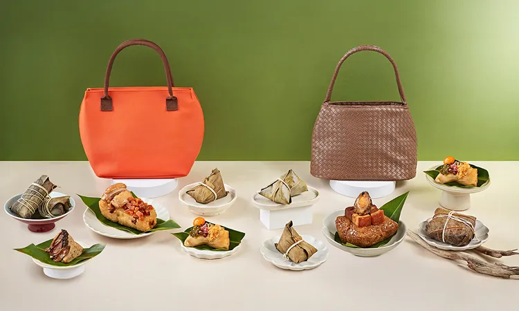台南遠東香格里拉飯店推出兩款「尊榮粽子禮袋」組合，從經典奢華暖橘，到年度代表色的摩卡慕斯，袋內還有由五星主廚精心設計的多顆粽款，售價1398至1698元。業者提供