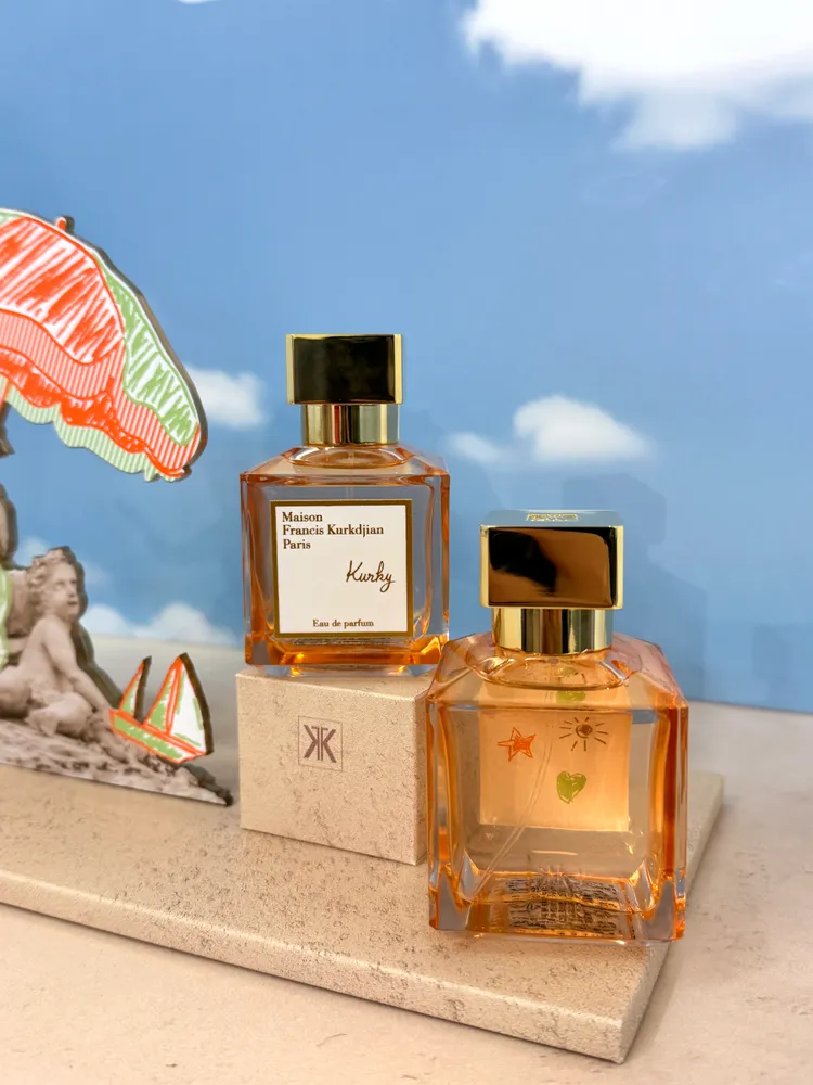 MFK Kurky淡香精擁有蜜桃橘色調玻璃瓶身，標籤紙內側還有童趣手繪圖騰。張家玲攝