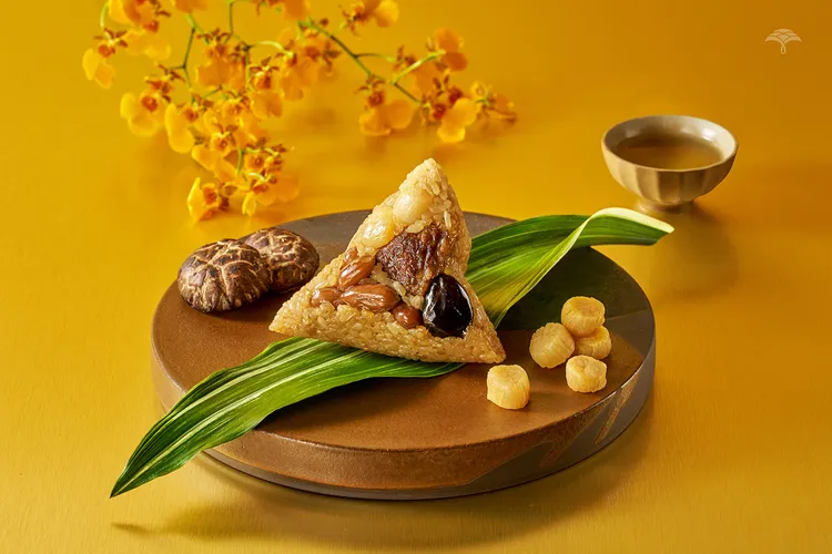 御品珍珠干貝粽包覆濃厚大海味的珍珠干貝，口感層次豐富。業者提供