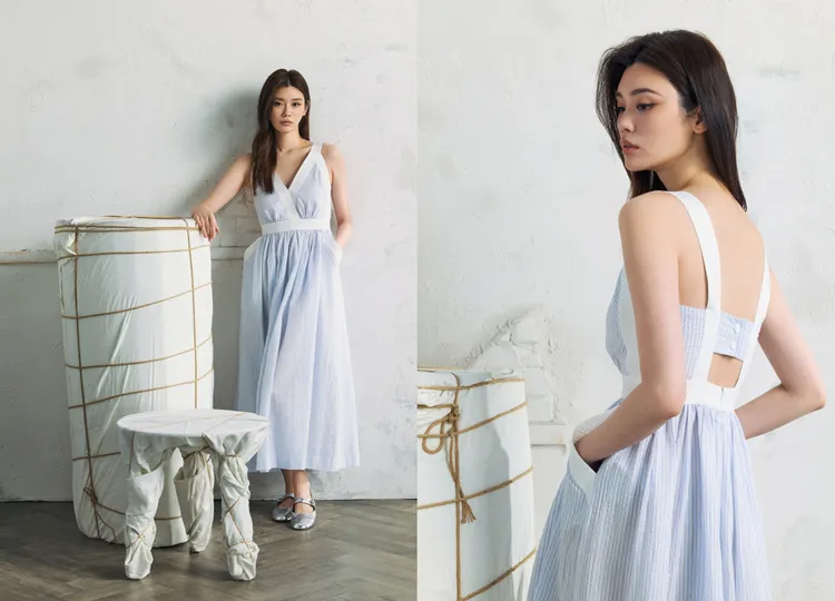奚夢瑤穿著藍白泡泡紗V領連衣裙展現度假隨性氣息。品牌提供