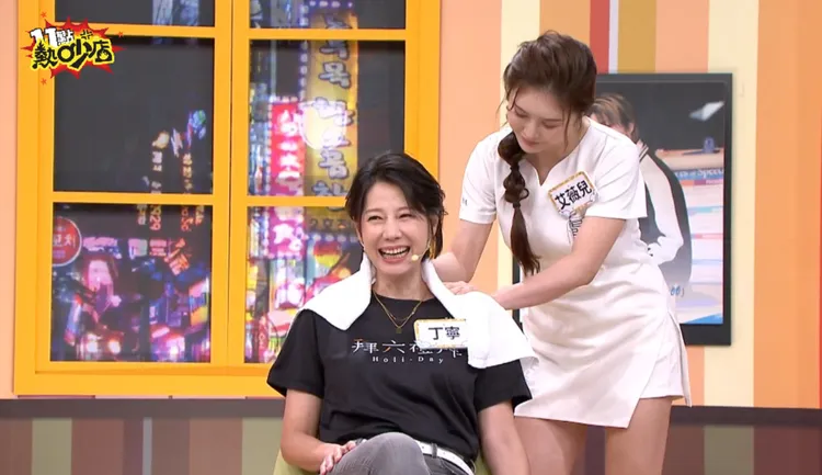 丁寧（前）被安排中式指壓按摩消除壓力。TVBS提供