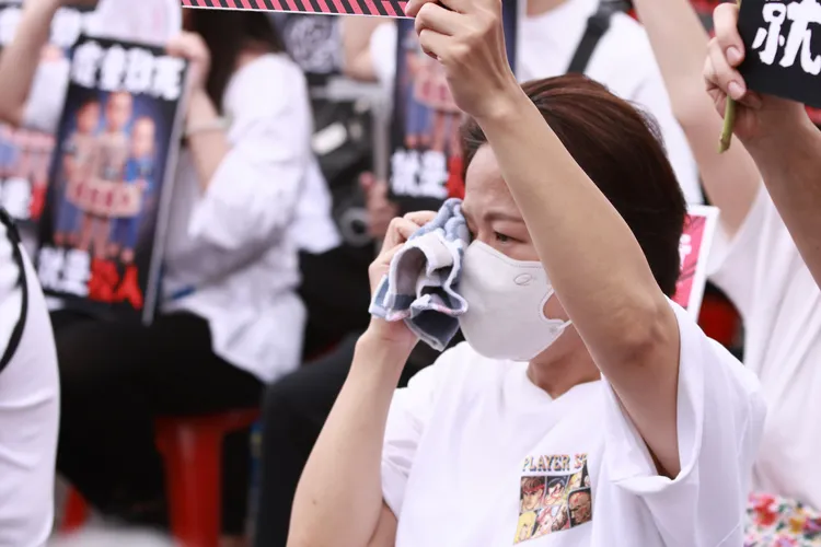 民眾在活動現場哭了。彭欣偉攝
