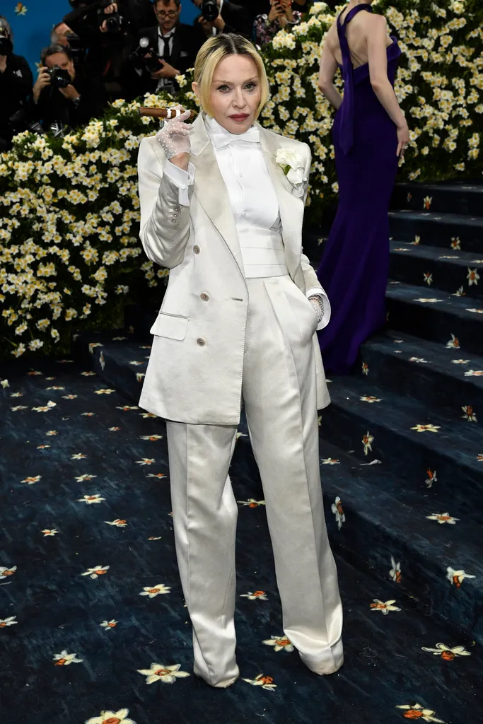 瑪丹娜的服裝出自Tom Ford。美聯社