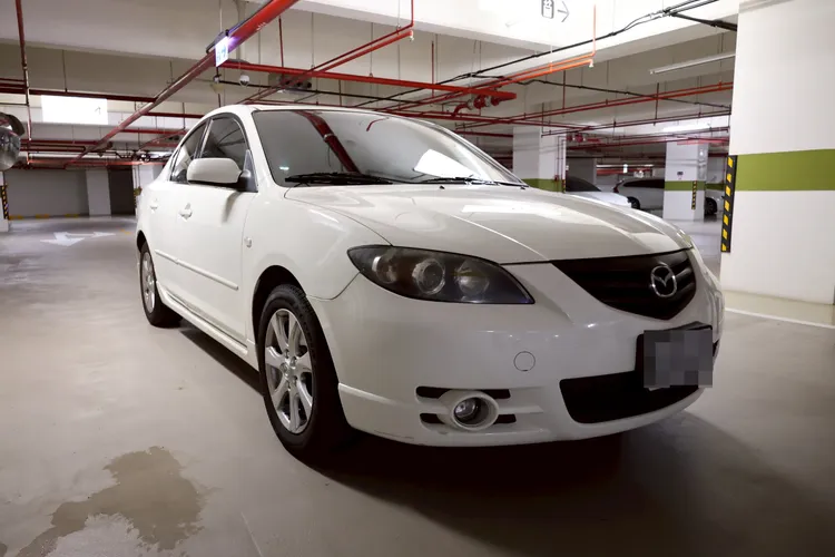 車齡約20年之馬自達自用小客車。新北分署提供