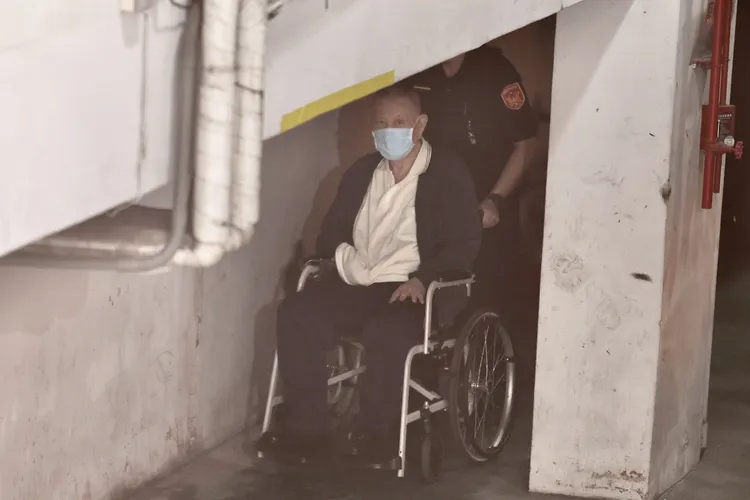 沈慶京今天與柯文哲一起搭囚車到北院應訊。彭欣偉攝