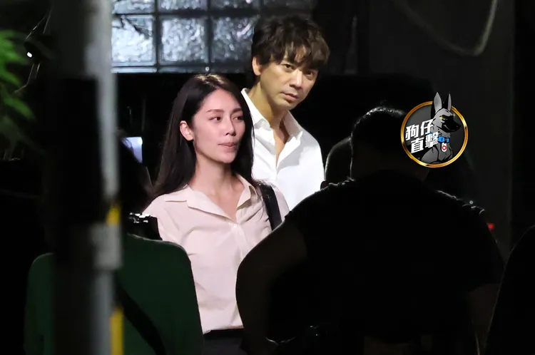 信與長髮模特兒外表十分登對。特勤中心攝