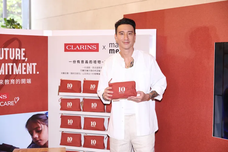 王陽明手拿今年度克蘭詩瑪莉吃飽包。彭欣偉攝