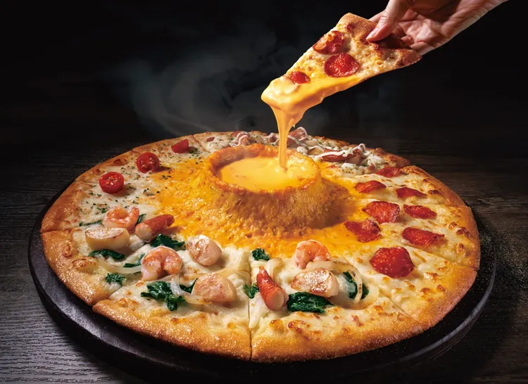 業者強調「火山披薩」是由達美樂日本與台灣達美樂共同開發。達美樂提供