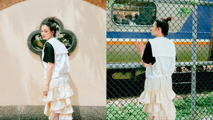 姚愛寗以工裝背心搭配蛋糕裙，並在火車前拍出獨特的文青感照片。品牌提供