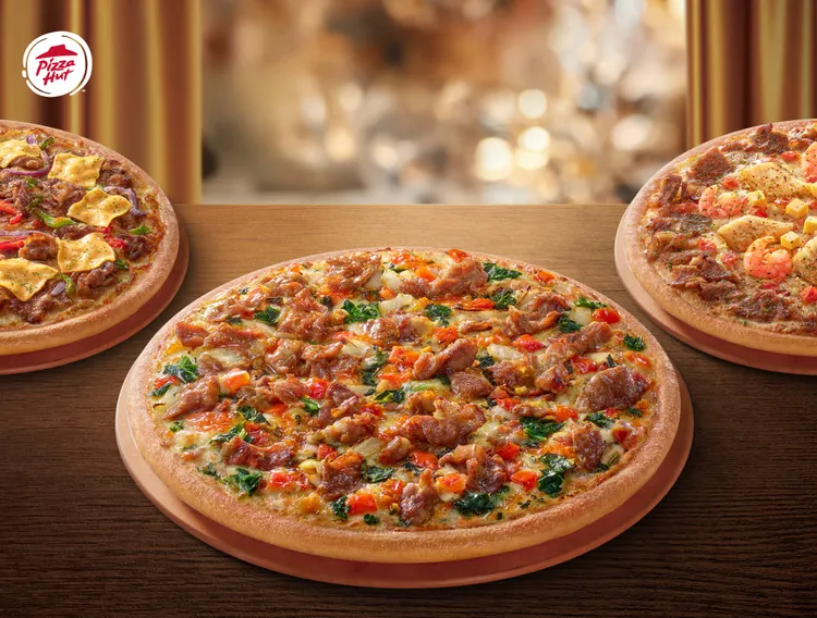 單點私廚大披薩外送6折優惠，平日就能吃到包含松露干貝鮮蝦起司、泰式檸檬椒麻豬等5款口味。必勝客提供