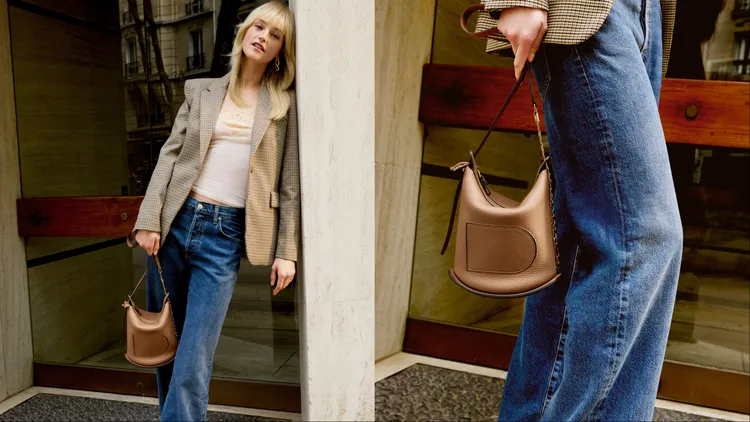 Delvaux Pin系列以「兩道線條，一抹微笑」作為招牌設計。品牌提供