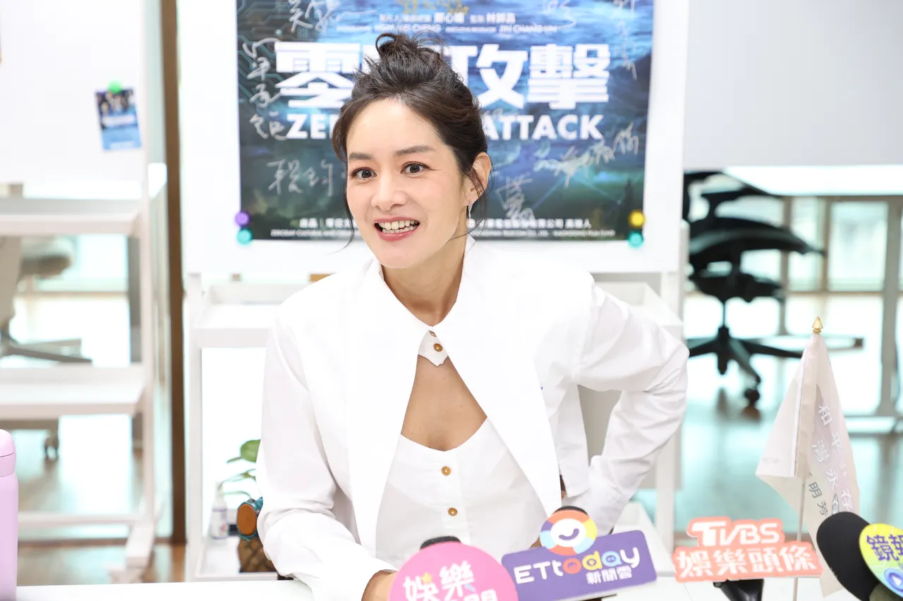 Jane分享借机教儿子储蓄的重要。摄影中心摄影