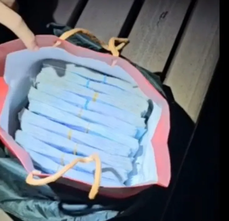 淡水警方成功拦阻200万元,险些被诈团车手带走。翻摄画面