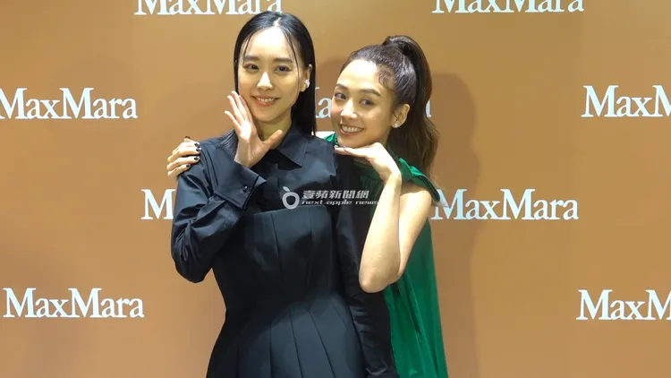 鬼鬼（右）見到昔日戰友劉容嘉開心合影。特勤中心攝