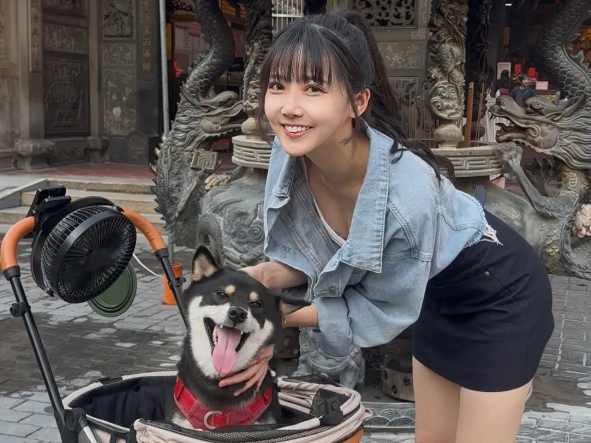 宸宸為照顧毛小孩,颱風天也要出門放風,全年無休。法人流浪動物之家基金會提供