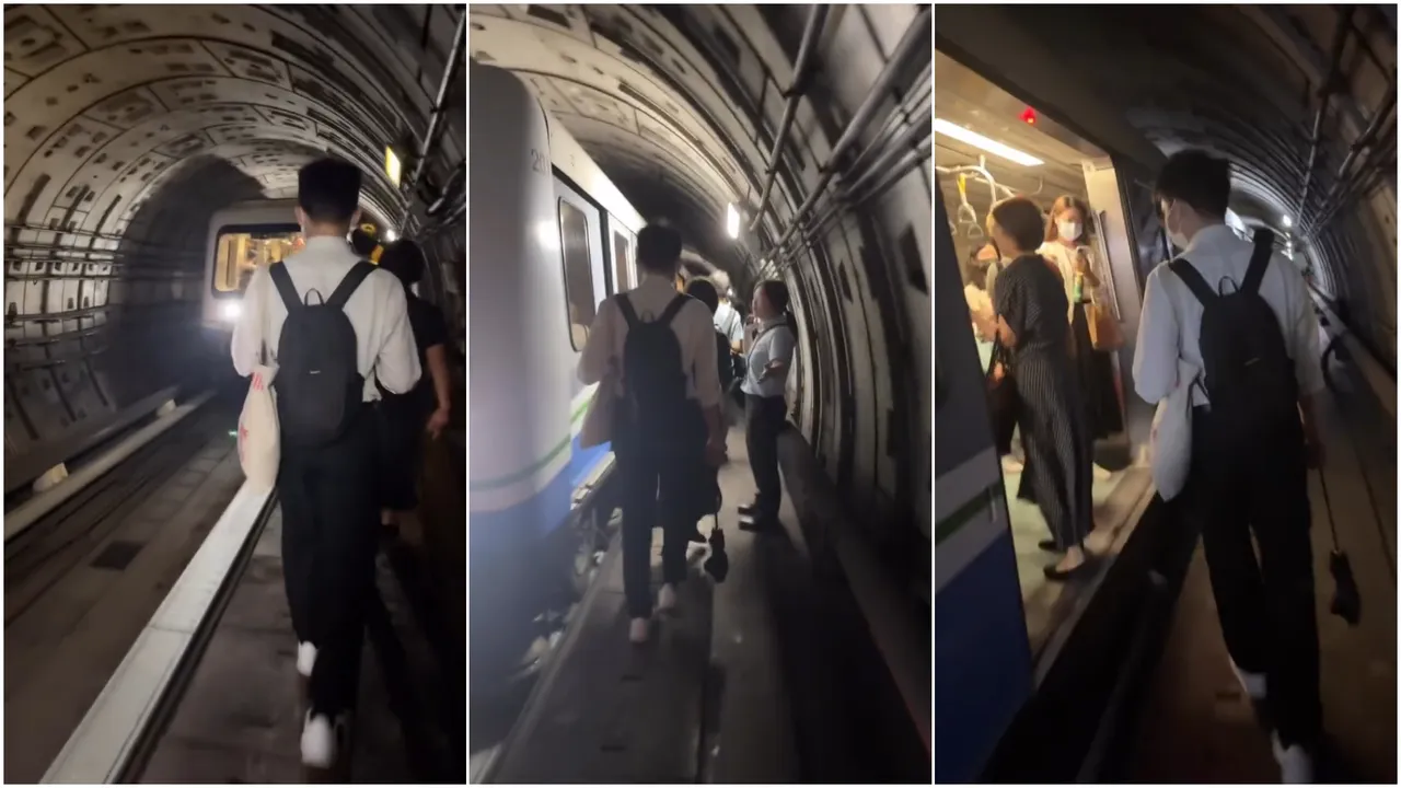 北捷文湖線乘客摸黑走在隧道內換乘。Threads網友「@yugorich_」授權提供