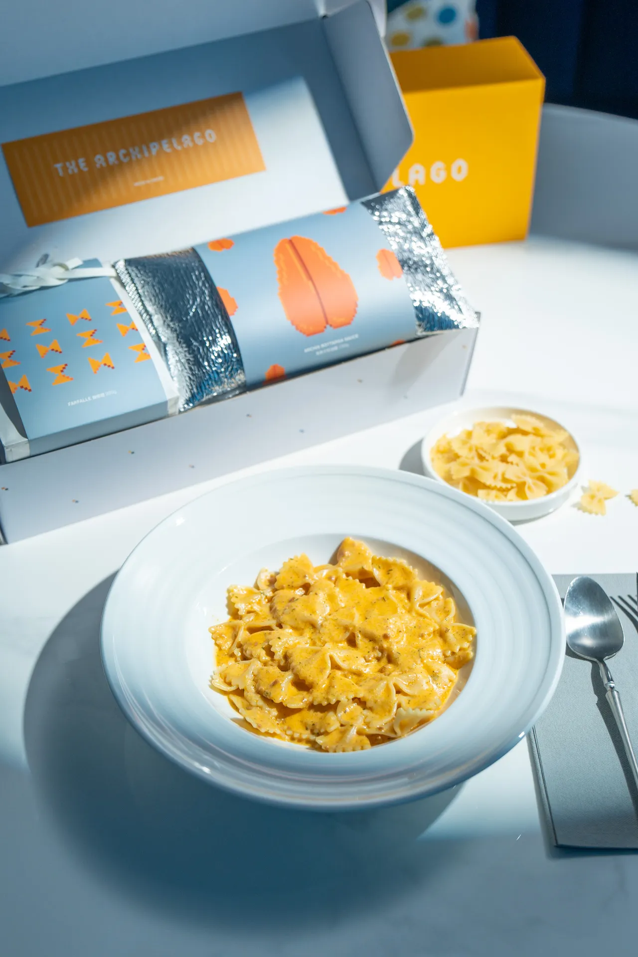 archi Al Dente 招牌乌鱼子奶油蝴蝶面。业者提供