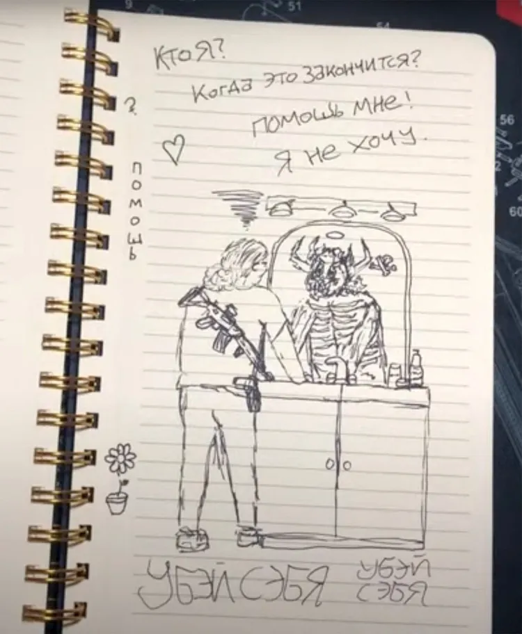 槍手在筆記本畫著似乎是與魔鬼做交易的圖案。路透社