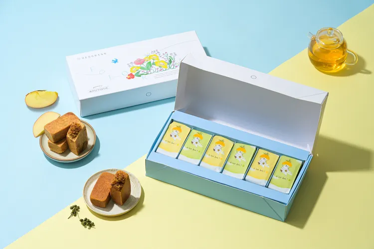 「食時盼」的「果然好日子禮盒藏心話系列」主打蘋安語蘋果鳳梨酥，在鳳梨酥中加入天然蘋果乾，酸甜更有層次。19號奶油提供