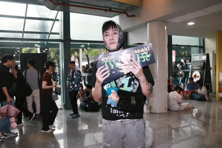 艾迪帶父母來看偶像。彭欣偉攝