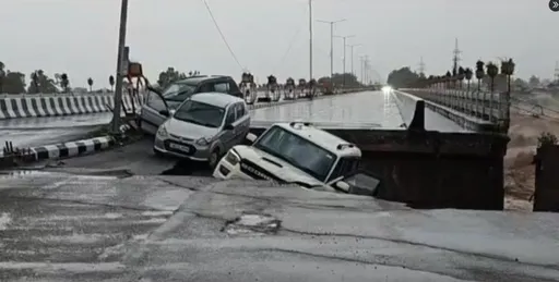 豆腐渣工程禁不起豪雨沖刷 車開一半被大坑吞掉