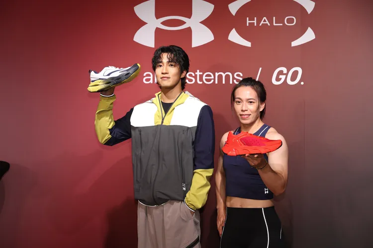 婁峻碩（左）、郭婞淳（右）分別搭配螢光黃、紅色款「UA HALO」訓練鞋。彭欣偉攝