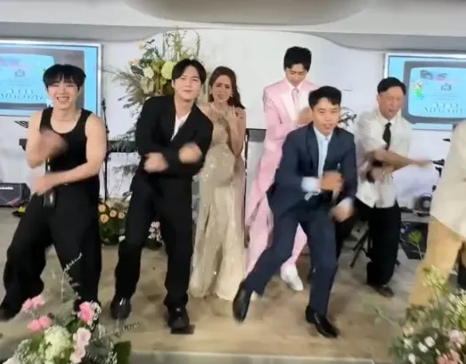 新郎身為專業舞者，與友人一起跳起來，讓新娘子儍眼。翻攝9__bibi IG