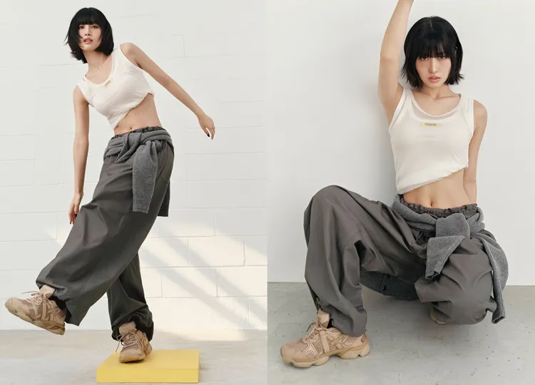 MOMO以短版小背心配上軍綠色工裝褲搭配棕色款「TIGRUN」。品牌提供