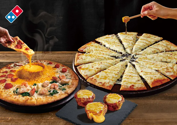 開學季17款優惠包含起司火山披薩、一公斤起司巨無霸披薩都有折扣。達美樂提供