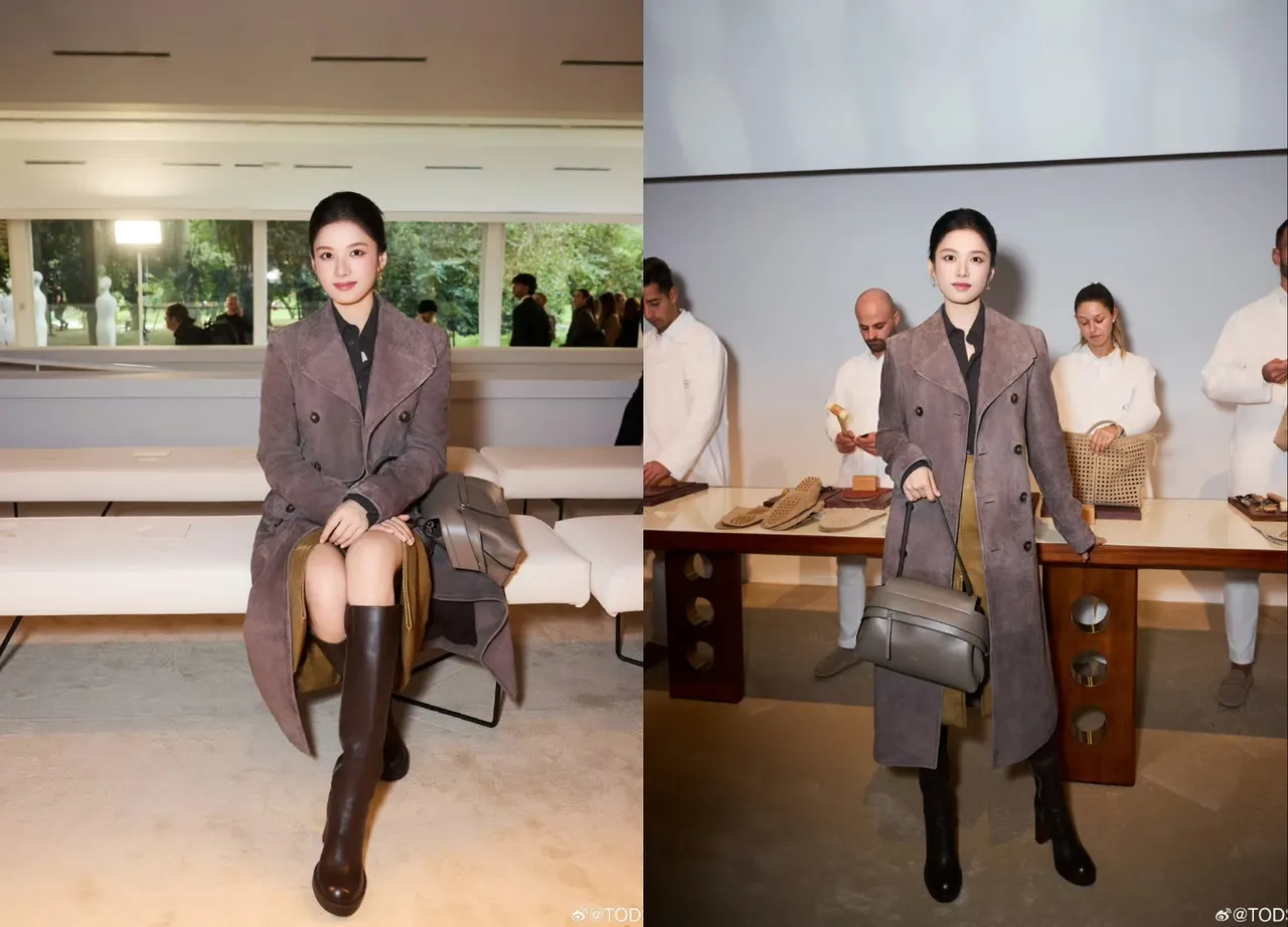 張婧儀以灰紫色麂皮大衣搭配開衩長裙、咖啡色長靴。翻攝TOD’S微博