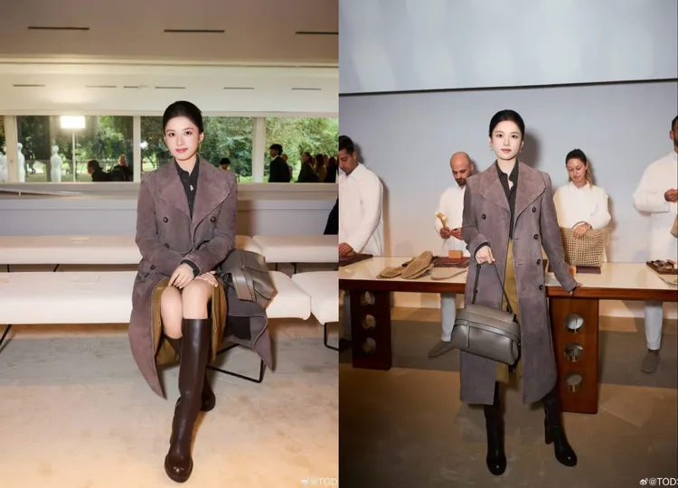張婧儀以灰紫色麂皮大衣搭配開衩長裙、咖啡色長靴。翻攝TOD’S微博