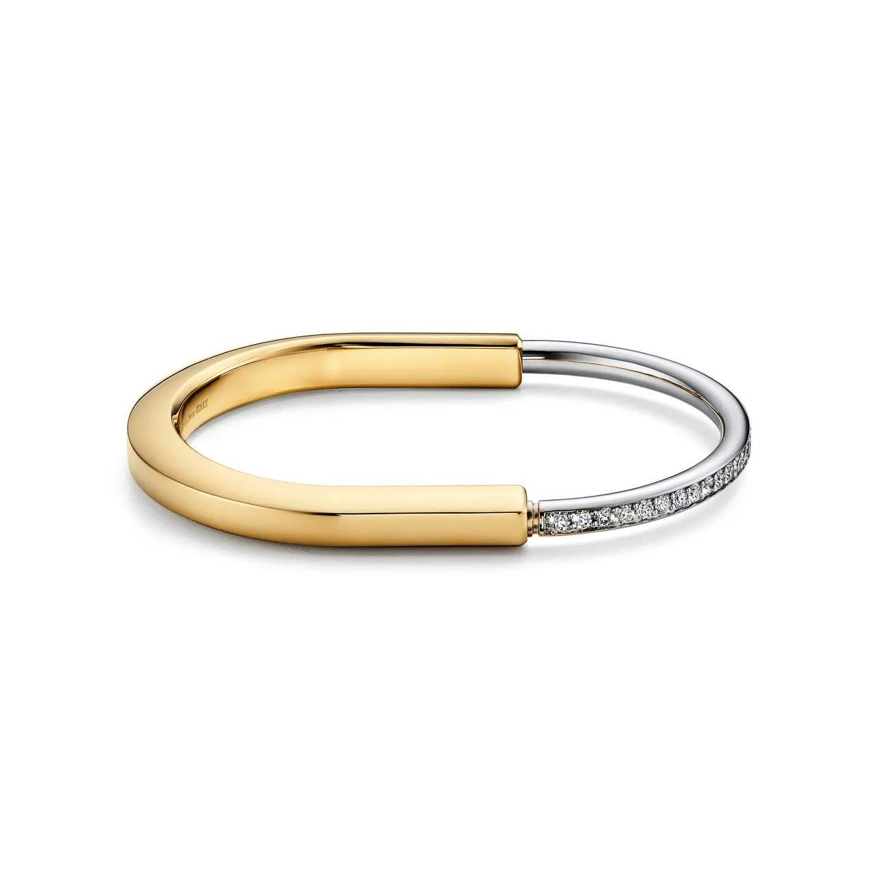 Tiffany Lock 18K黃金與白K金鑽石手環。品牌提供