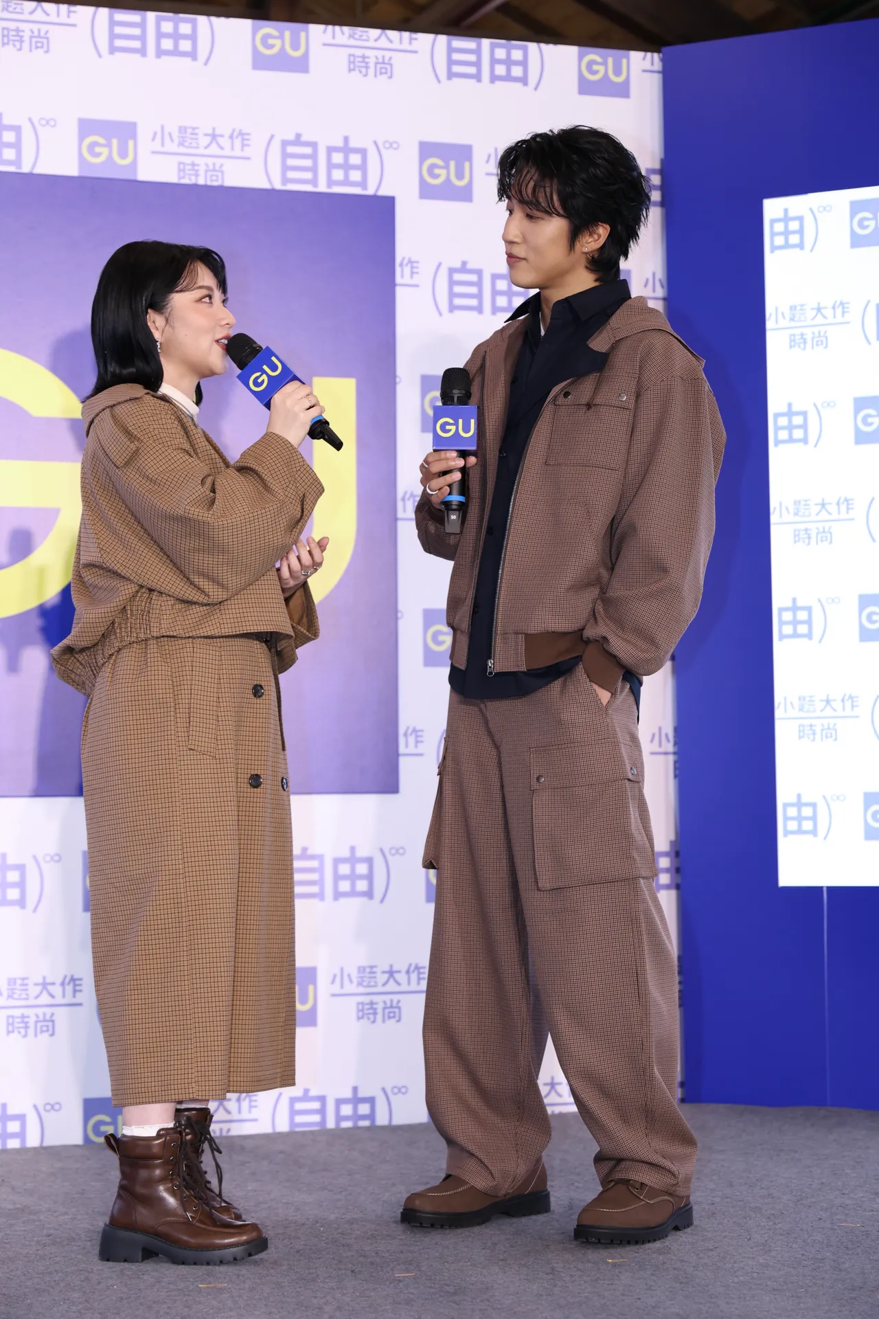 焦凡凡(左)与娄峻硕(右)换上情侣装出席时尚活动。彭欣伟摄