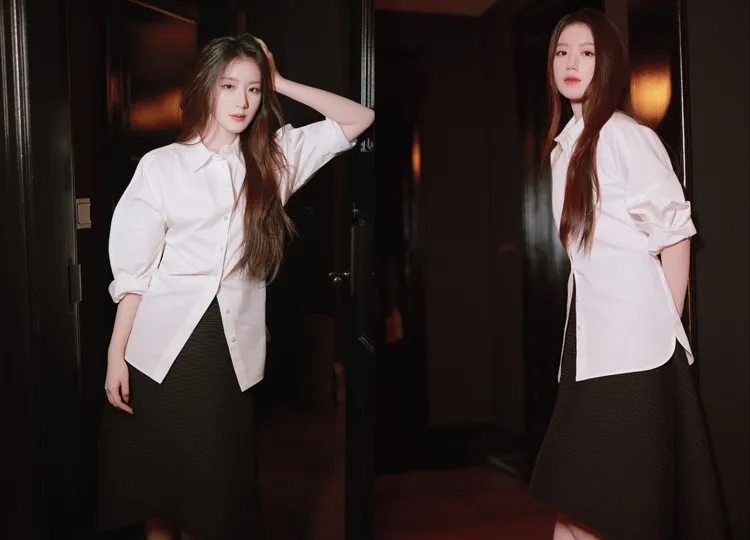 葉舒華以白色襯衫搭配網狀紋路的黑色半身裙。翻攝葉舒華IG