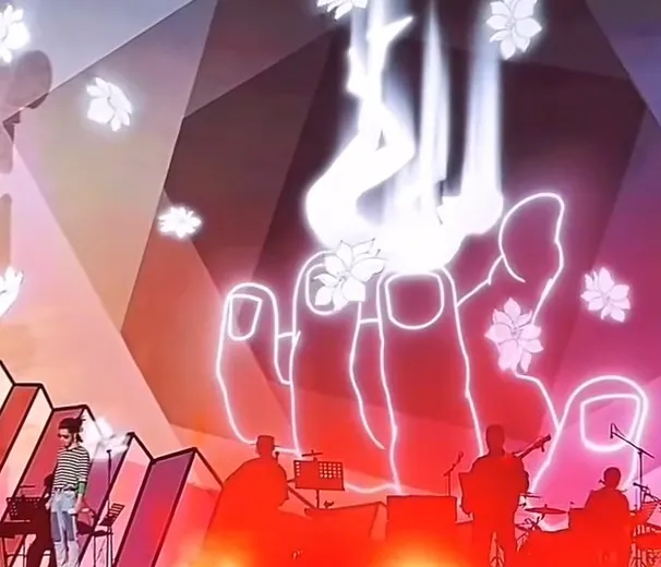 華晨宇的舞台特效，從高處墜落的白色人形有隻大手接住了他。翻攝請我吃泡芙謝謝yu小紅書