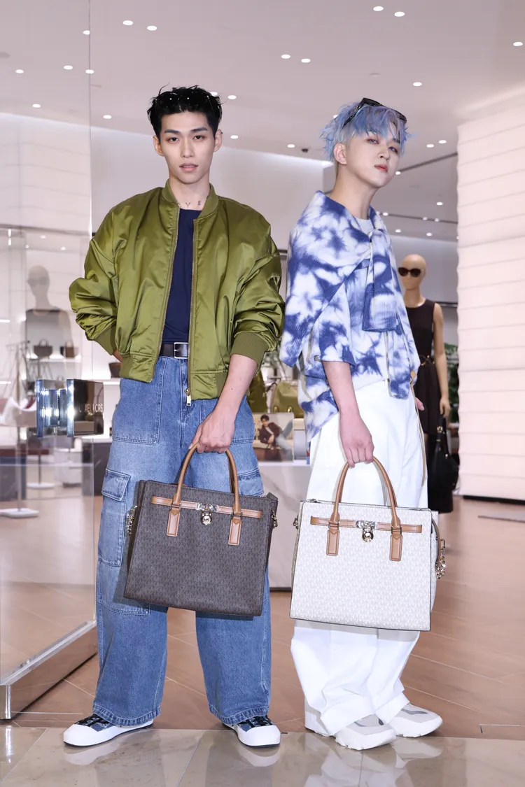 U:NUS成員蔡承祐（左）、吳昱廷（右）現身Michael Kors新店開幕派對。彭欣偉攝