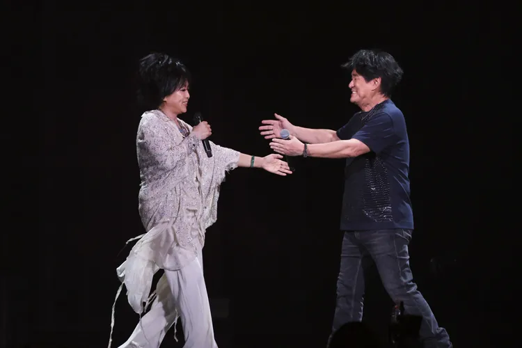 周華健與齊豫開心相擁。彭欣偉攝