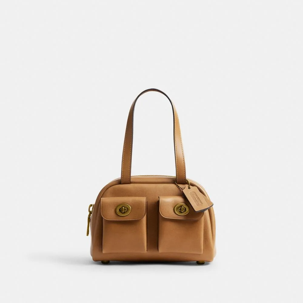 COACH WIN 20双转扣皮革手袋,1万6800元。品牌提供