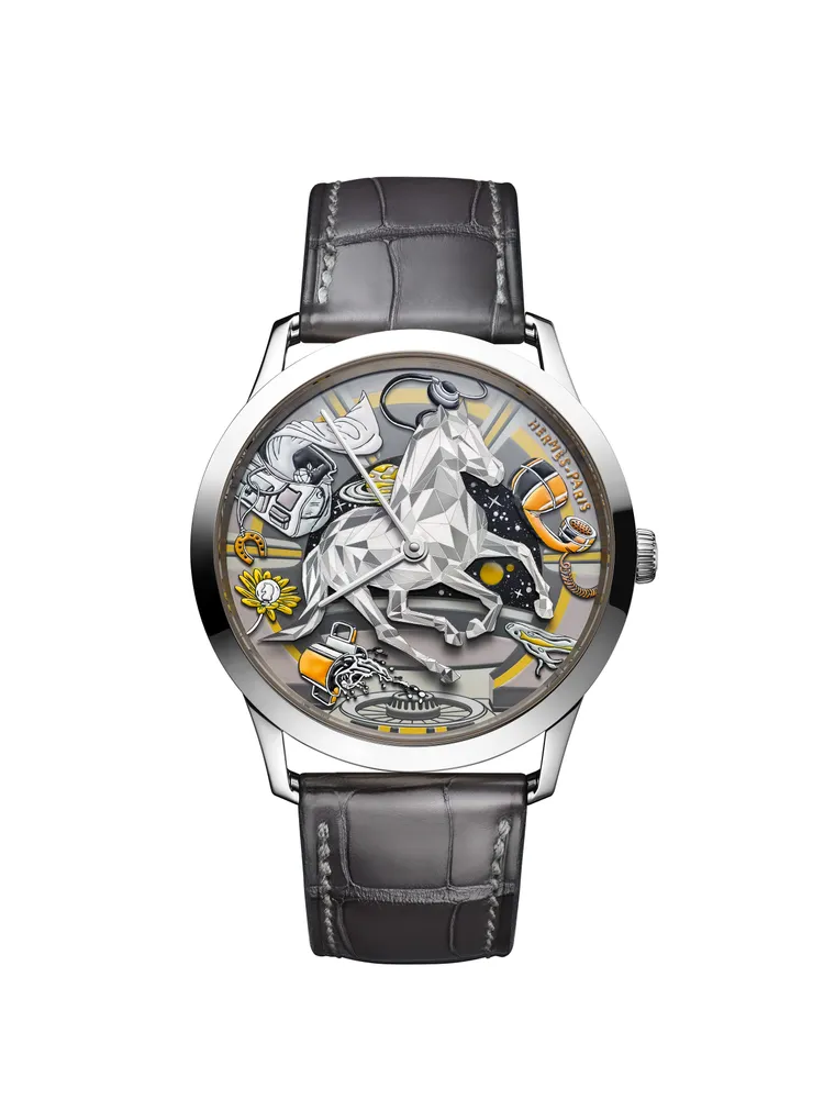 愛馬仕Slim d'Hermès Faubourg of Dreams工藝腕錶，39.5mm，白K金錶殼，砂金石及藍寶石水晶錶盤，霧面短吻鱷魚皮（石墨色或深海藍色）錶帶，愛馬仕自製H1950超薄自動上鍊機芯，動力儲存 48小時，防水深度30米，限量 24 只。品牌提供