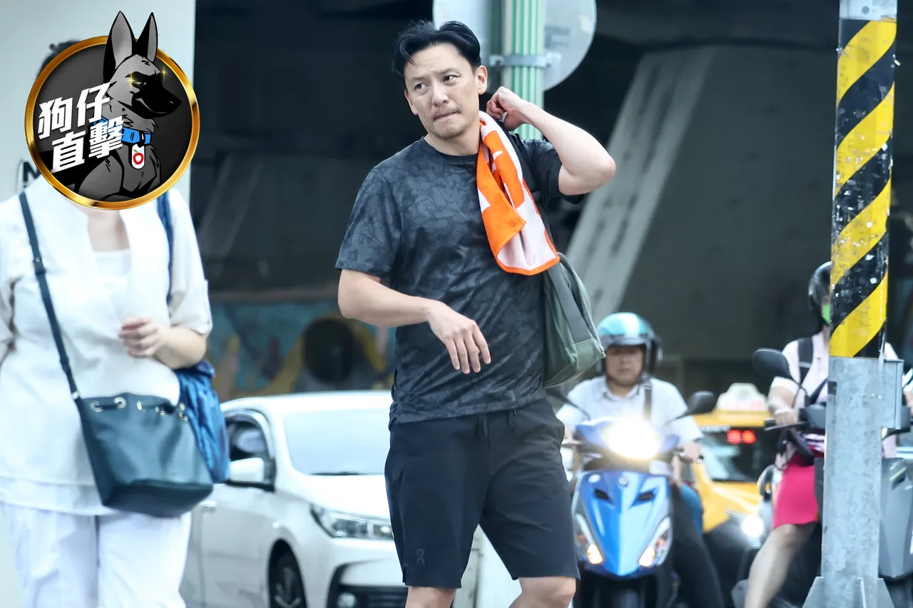 影帝张震在走去健身房运动的路上。特勤中心摄