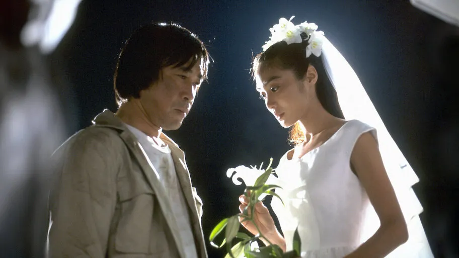 武田铁矢(左)和浅野温子主演的《101次求婚》轰动90年代。剧照
